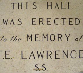 Plaque with wording dedicating outpatients hall to memory of T E Lawrence