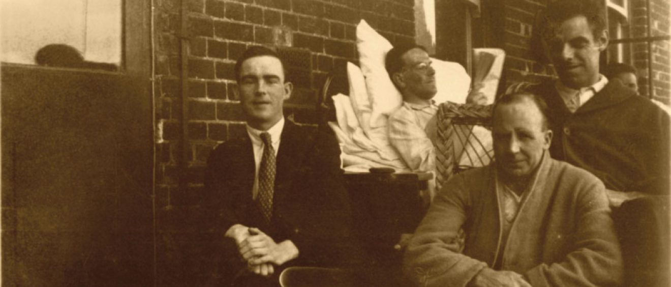 Patients sat outside on the balcony