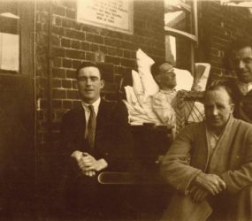 Patients sat outside on the balcony