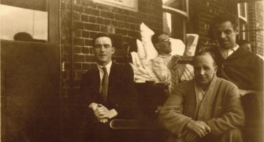 Patients sat outside on the balcony
