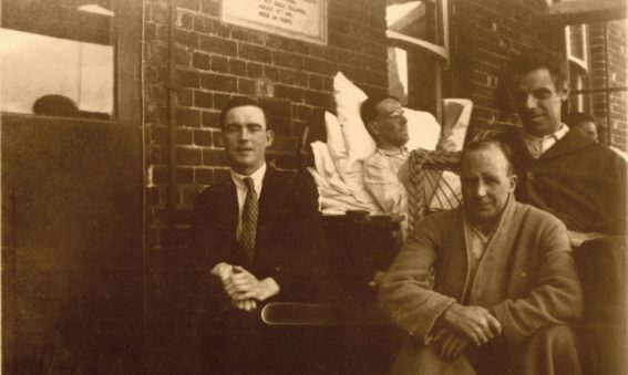 Patients sat outside on the balcony