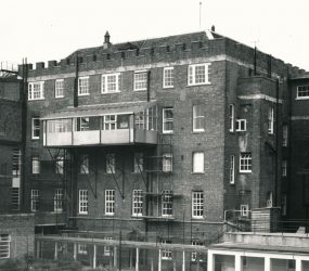 Balcony attached to side of building 3 floors up