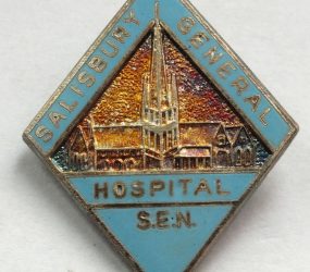 Diamond shaped badge with Salisbury Cathedral