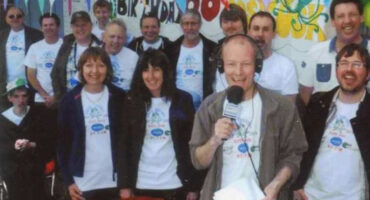 colour photograph of group of people outside Radio Odstock