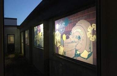 window design viewed from outside at night