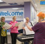Staff singing with keyboard accompaniment