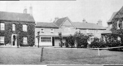 Black and white photo of buildings in a terrace