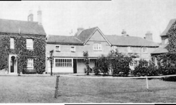 Black and white photo of buildings in a terrace