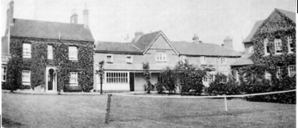 Black and white photo of buildings in a terrace