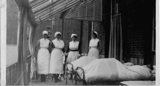 Black and white photograph of hospital ward