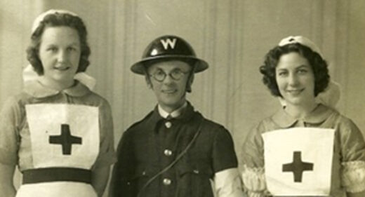 Sepia photo of 2 Red Cross Nurses and WW2 warden