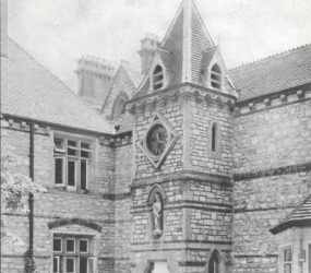 Clock tower and front entrance of the Herbert Home
