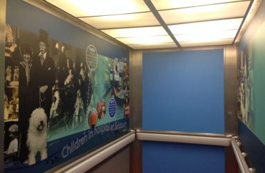 Montage of historical images in lift interior