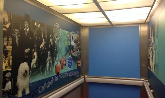 Montage of historical images in lift interior