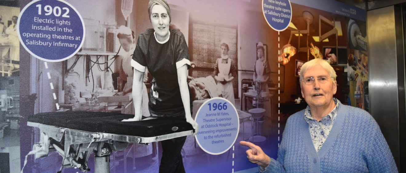 Jeanne Yates today points to photo of herself in 1966 displayed in hospital lift