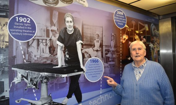 Jeanne Yates today points to photo of herself in 1966 displayed in hospital lift