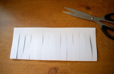 strips cut all the way along folded edge