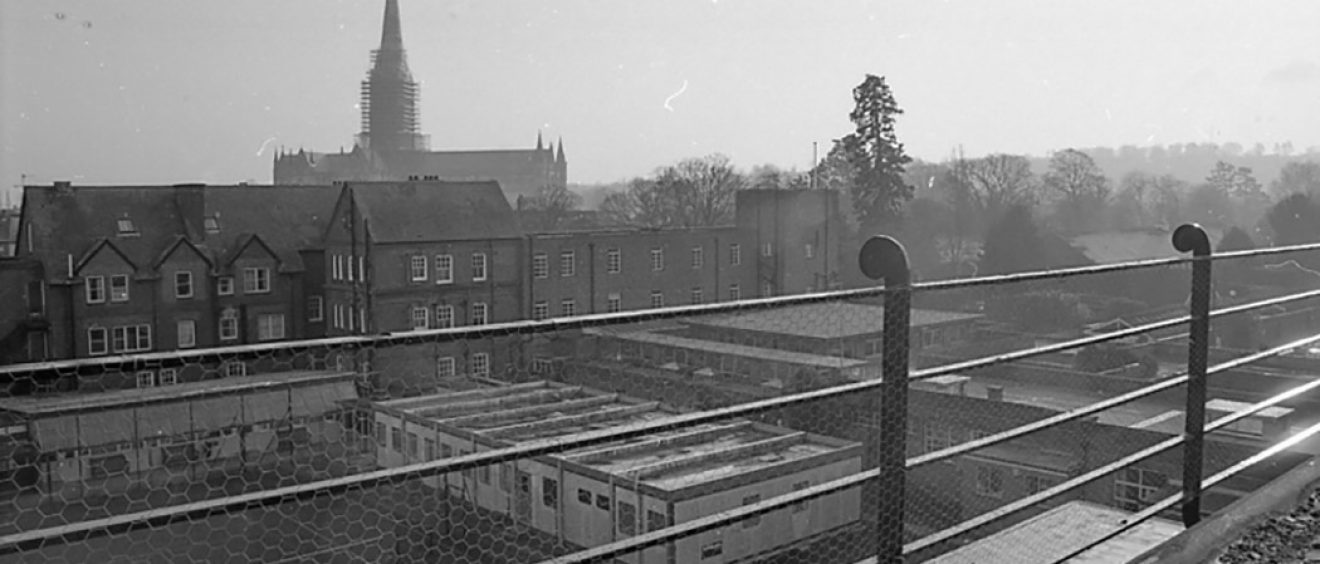 View across SGI rooftops, with cathedral spire in background