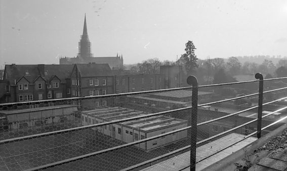 View across SGI rooftops, with cathedral spire in background